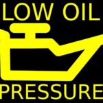 oil pressure light flashing while driving